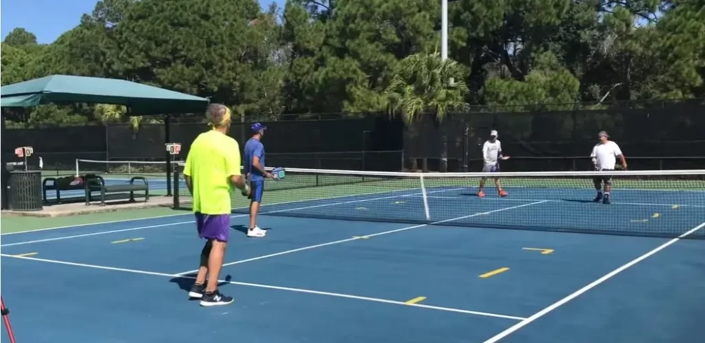 Playing Pickleball On A Temporarily Converted Tennis Court