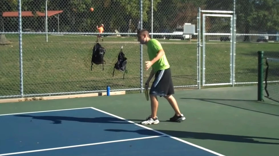 Stand Behind the Pickleball Service Baseline